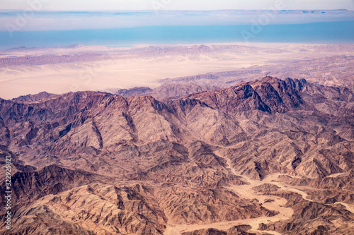 Aerial view of mountains in the Sinai through an airplane window