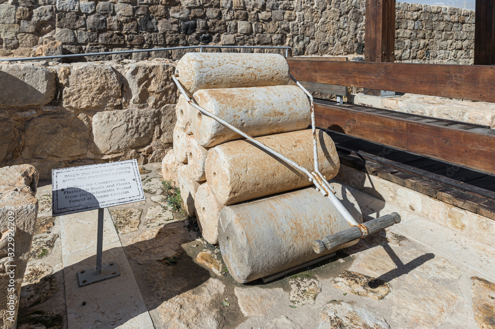 Rollers for compressing plaster on roofs and floors from the Helenistic period at the exhibit of the Museum of the Good Samaritan near Jerusalem in Israel Rollers for compressing plaster on roofs and floors from the Helenistic period at the exhibit of the Museum of the Good Samaritan near Jerusalem in Israel