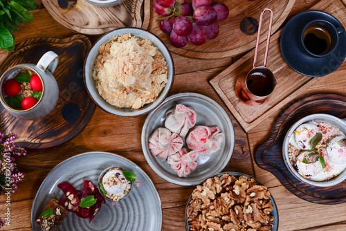 Traditional Georgian sweets and desserts. Baklava, nakhini, khinkali, matzoon, churchkhela, shotis puri or shoti photo