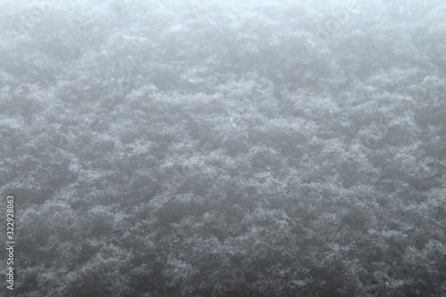 White fluffy snow texture with a gradient from light to dark