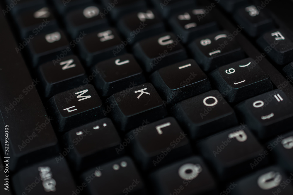 Photo macro digital keyboard computer for business on the dark and little light Photo macro digital keyboard computer for business on the dark and little light