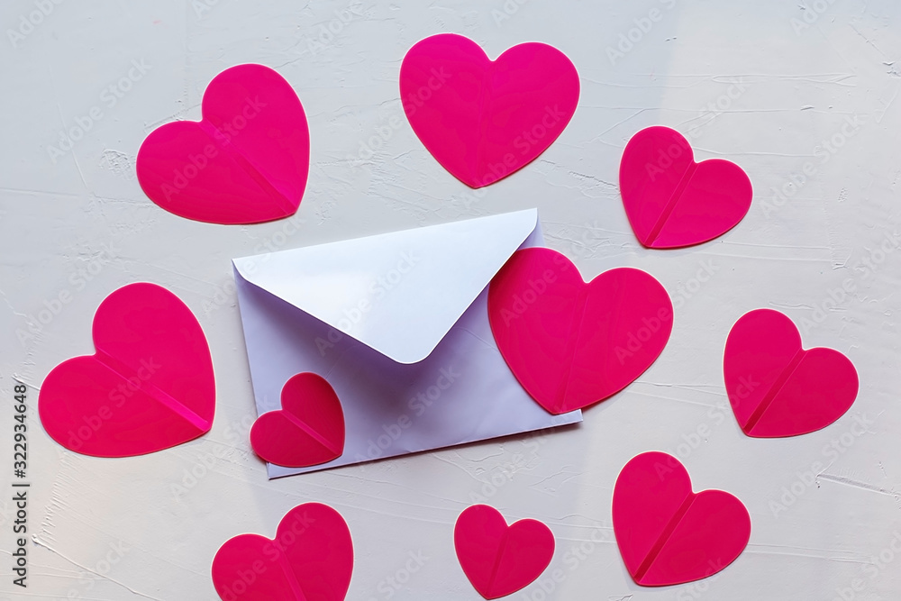 Valentine's day background. Envelope with pink hearts on a white background. Love letter Hearts Romance Lovey-Dovey