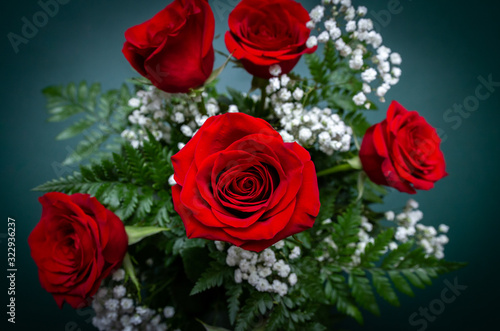 Top view of a bouquet of bright red roses