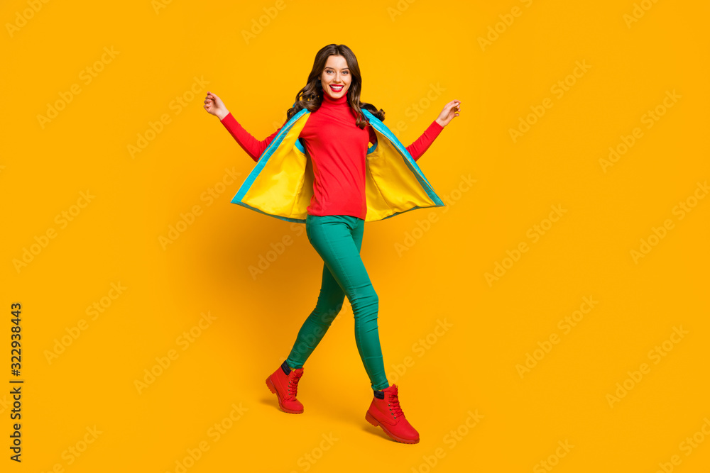 Full body photo of content cute sweet woman enjoy spring weekend go walk wear good look sweater shoes isolated over shine color background Full body photo of content cute sweet woman enjoy spring weekend go walk wear good look sweater shoes isolated over shine color background