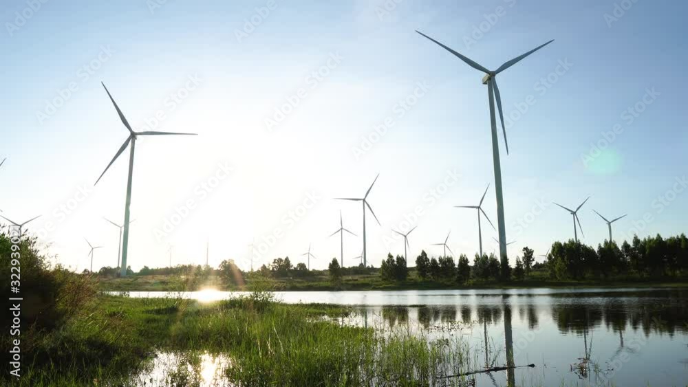 Aerial 4k, aerial, aerial view, alternative, clean, concept, development, eco, ecologview of Wind turbines Energy Production- 4k aerial shot on sunset. 4k drone footage turbines at sunrise with clouds Aerial 4k, aerial, aerial view, alternative, clean, concept, development, eco, ecologview of Wind turbines Energy Production- 4k aerial shot on sunset. 4k drone footage turbines at sunrise with clouds