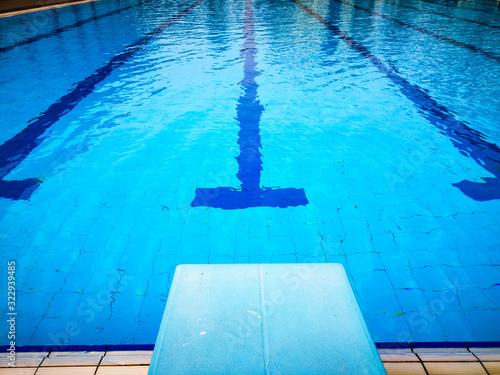 View of starting blocks and lanes in a public swimming pool