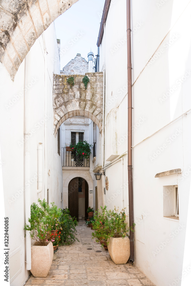 small street in  historical white town Locorotondo, Italy