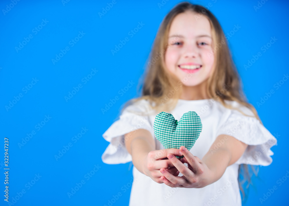 Love concept. Girl cute child show heart toy. Heart symbol of love. Romantic feelings. Kid adorable girl happy face play heart blue background. Celebrate valentines day. Love heart holiday decor Love concept. Girl cute child show heart toy. Heart symbol of love. Romantic feelings. Kid adorable girl happy face play heart blue background. Celebrate valentines day. Love heart holiday decor