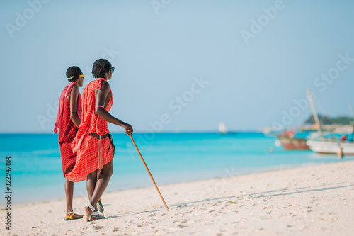 masai tribe member standing near the ocean in Zanzibar 11 February 2016
