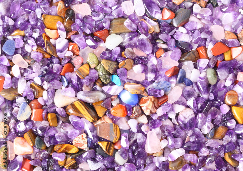 Collection of small semiprecious gemstones. Background image. Collection of small semiprecious gemstones. Background image.