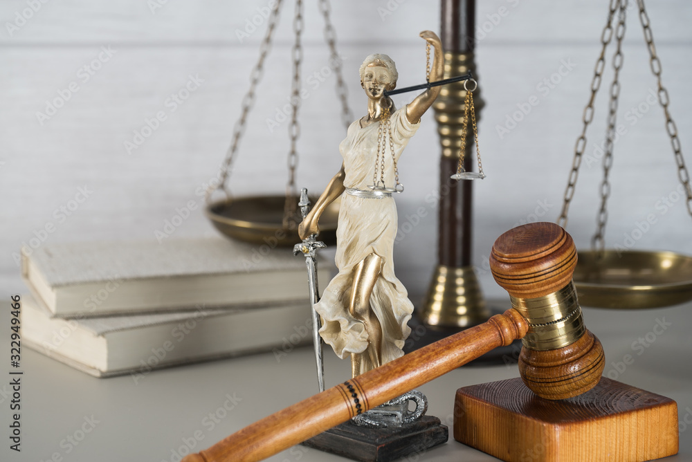 Φωτογραφία Law theme, mallet of the judge, white wooden background, books