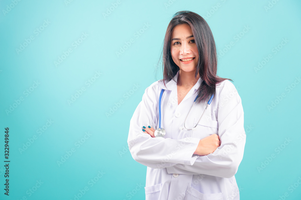 Portrait asian beautiful doctor woman smiling her standing with arms crossed Portrait asian beautiful doctor woman smiling her standing with arms crossed
