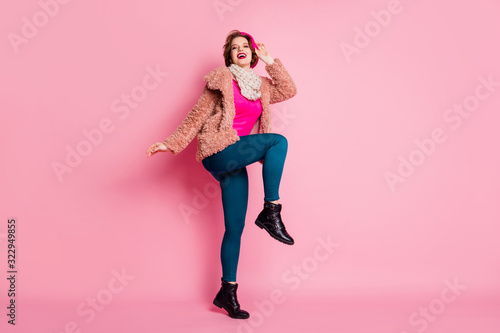 Full size photo of lovely pretty girl enjoy winter free time journey feel playful touch french cap wear pastel outer coat dotted shawl jumper pants isolated pink color background © deagreez