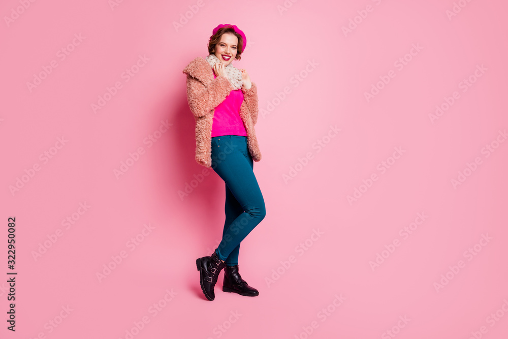 Full size photo of cheerful pretty girl enjoy free time touch her shawl feel content dreamy dream emotions wear shine dotted pants jumper isolated over pink color background