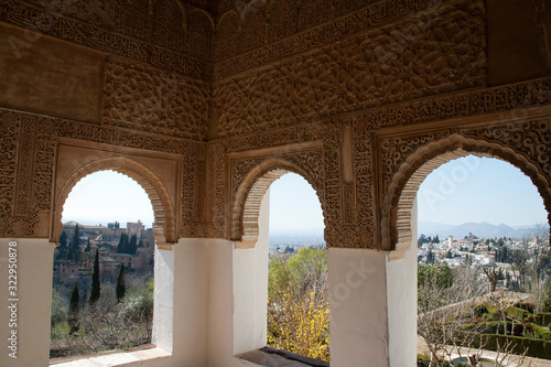 Granada Spain, view of gardens and city through arch windows