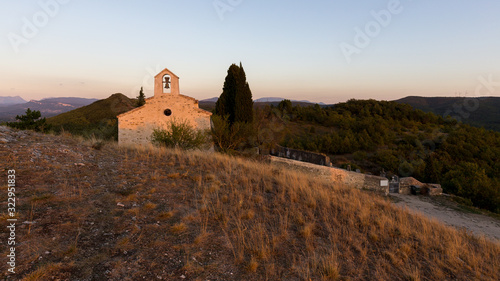 The late afternoon sun warms the facade of this chapel in the Drôme Provençale.