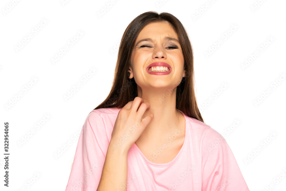 a young woman has an itch on her neck a young woman has an itch on her neck