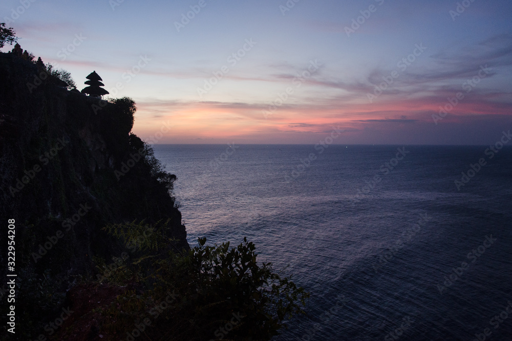 Sunset at the temple of uluwatu in Bali Sunset at the temple of uluwatu in Bali