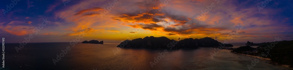 Amazing sunset aerial view of Nui Beach from drone. Ko Phi Phi Don, Thailand. Andaman Sea