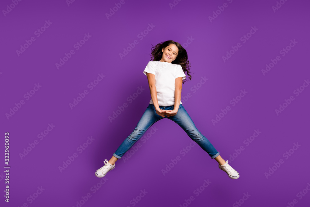 Full length body size view of her she nice attractive lovely cheerful cheery girlish wavy-haired girl jumping having fun isolated on bright vivid shine vibrant purple violet lilac color background