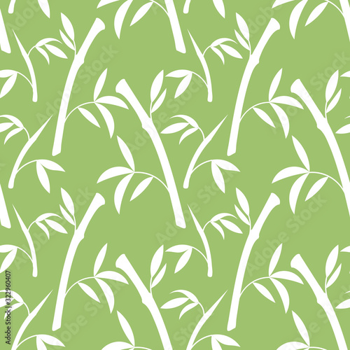 Decorative seamless pattern with bamboo branches and leaves