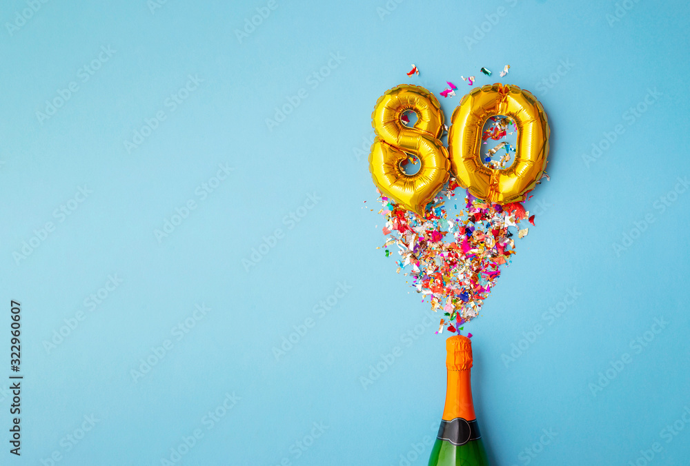 80th anniversary champagne bottle balloon pop - obrazy, fototapety, plakaty 