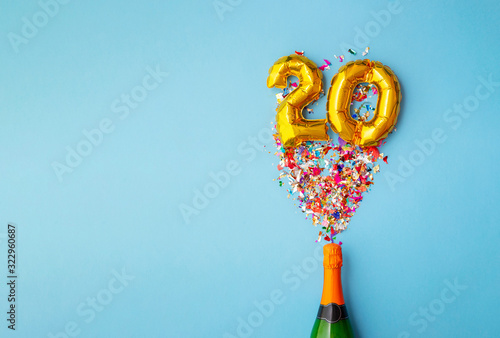 20th anniversary champagne bottle balloon pop photo