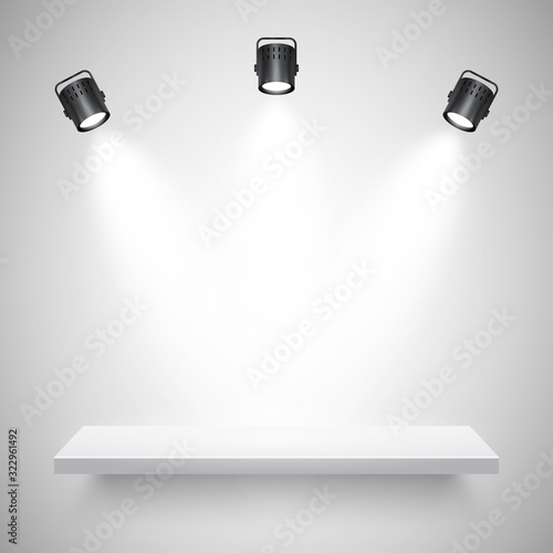 Illuminated realistic wall shelf. Empty store rack. Studio background with spotlights. Vector illustration.