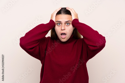 Teenager girl over isolated background with surprise facial expression © luismolinero