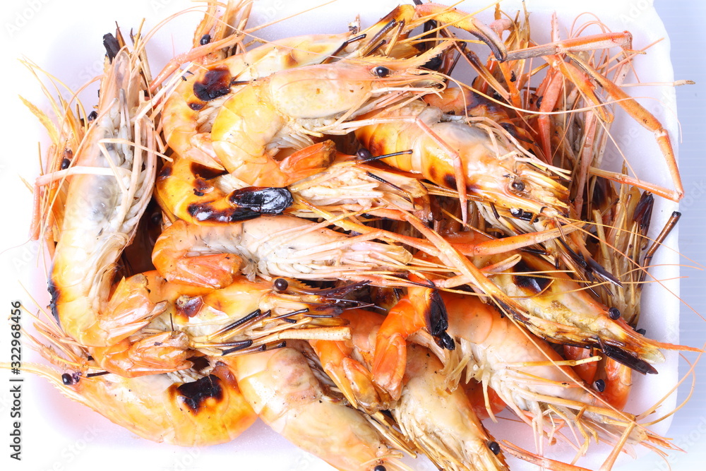 Grilled shrimps on white background Grilled shrimps on white background