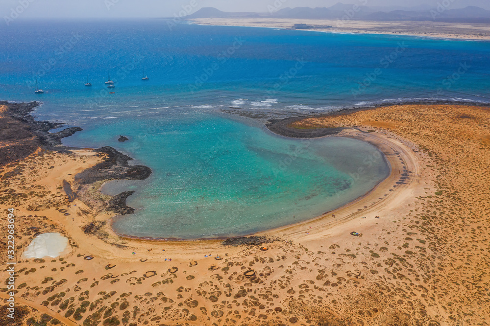 The Isla de Lobos in Fuerteventura, Spain with the Playa de la Concha. Aerial drone shot in october 2019