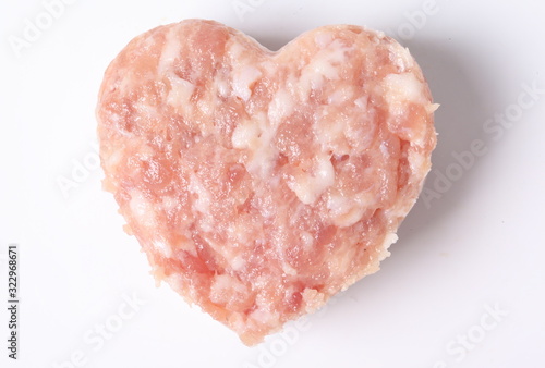 Raw ground meat for cooking on white background