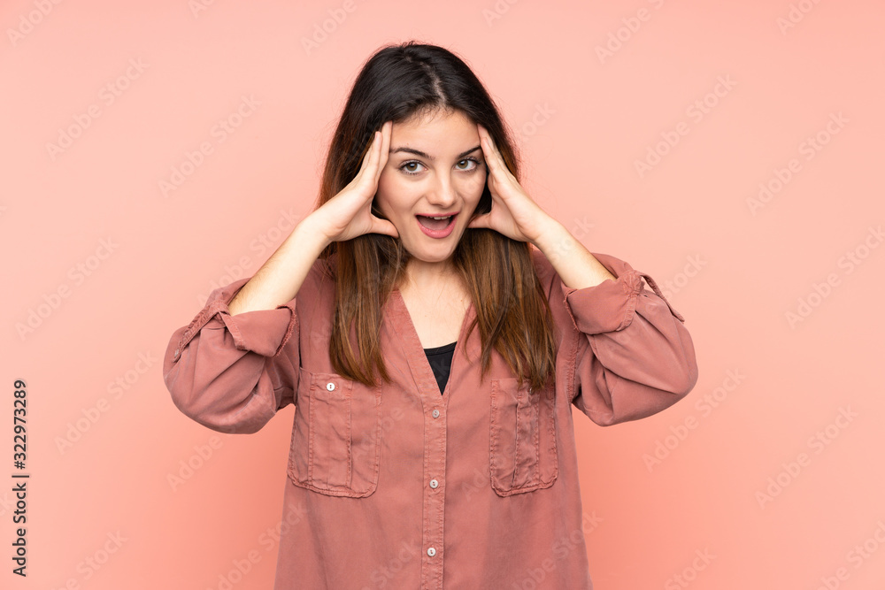 Young caucasian woman isolated on pink background with surprise expression Young caucasian woman isolated on pink background with surprise expression