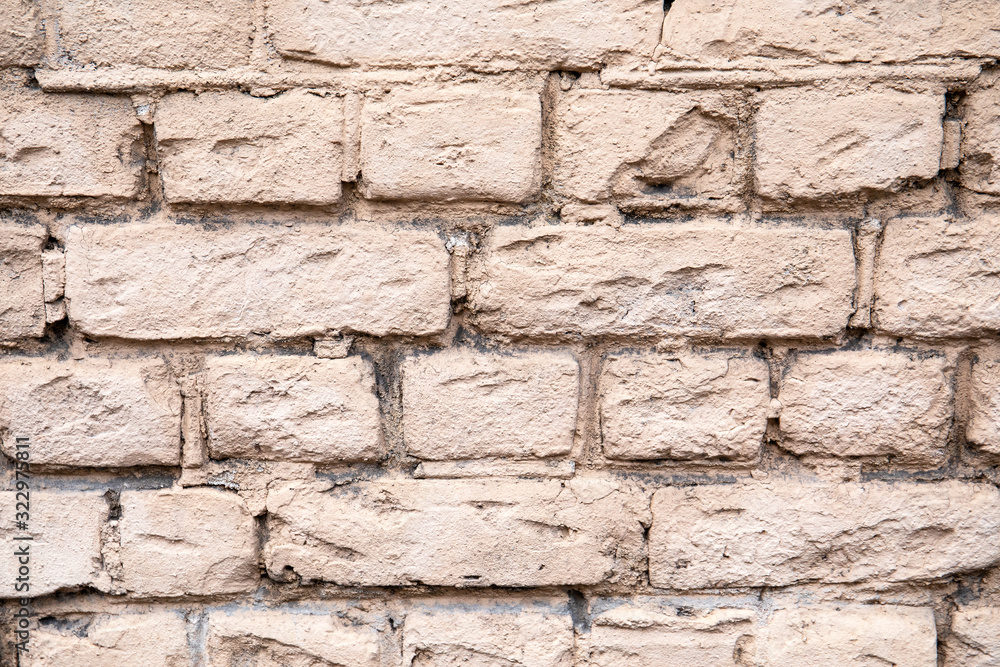 Obraz premium Brick wall. Decorative plaster, interior or exterior.