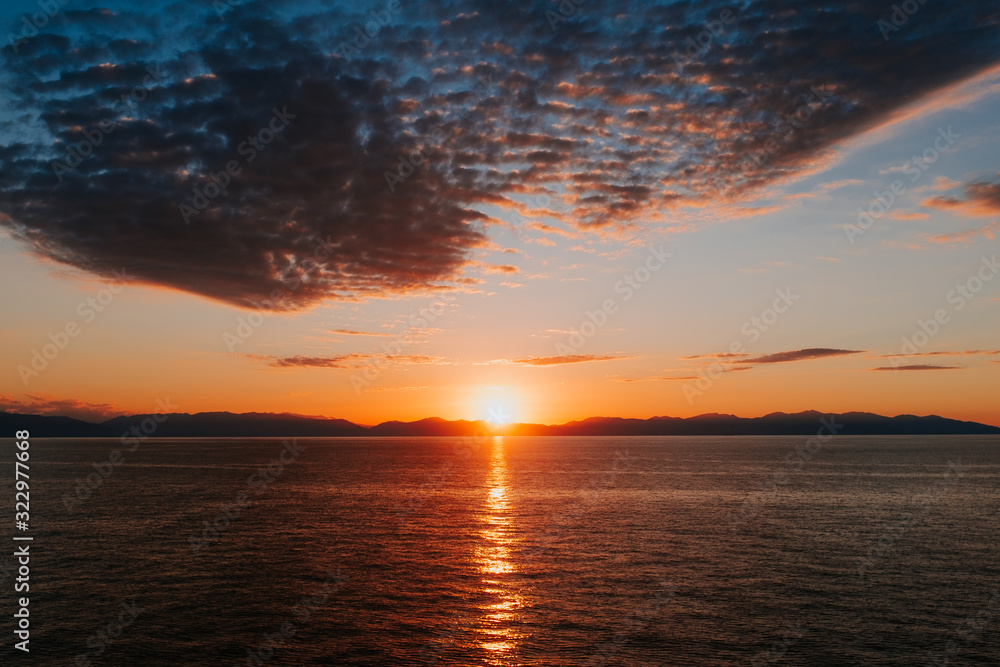Naklejka premium Tramonto sulla costa della Sardegna
