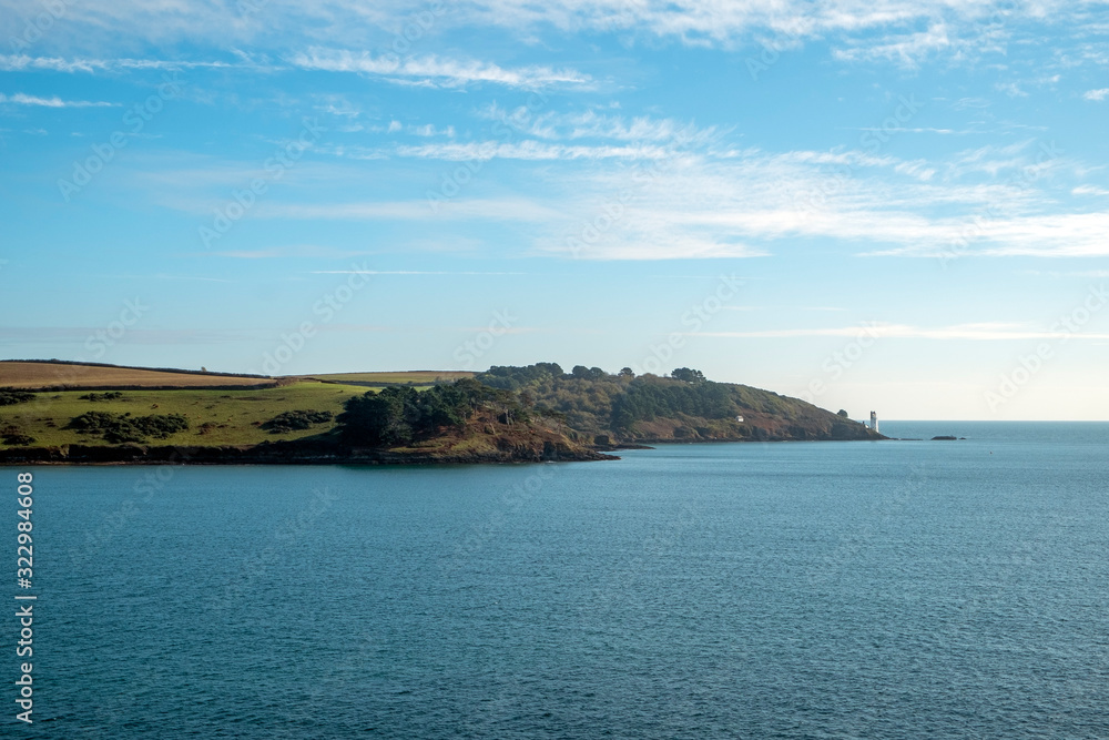 The view to St Anthony Head and the lighthouse from St Mawes, Cornwall, UK