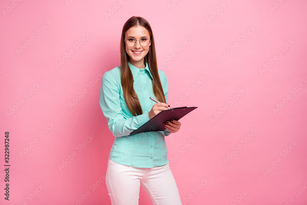 Portrait of charming pretty girl marketer hold clip board write to-do list check work tips wear good look teal clothes isolated over pastel color background Portrait of charming pretty girl marketer hold clip board write to-do list check work tips wear good look teal clothes isolated over pastel color background