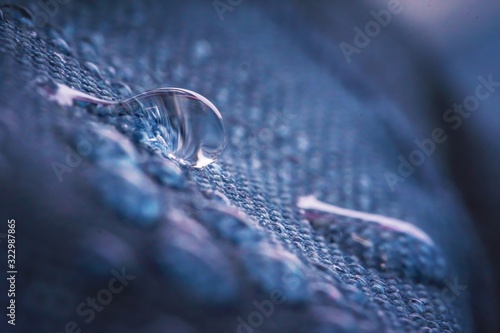Water drops on impregnated waterproof fabric.