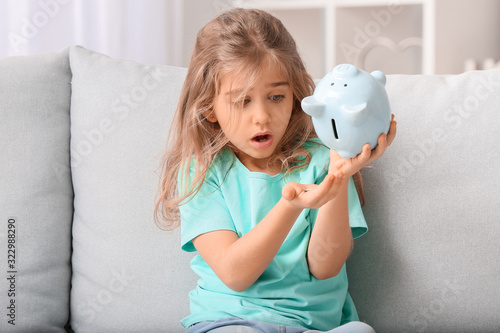 Worried cute girl with empt...