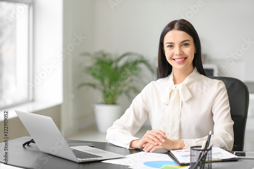 Female accountant working in office photo