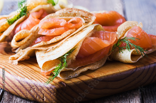 Russian style blini with smoked salmon, holiday Maslenitsa  ppetizer photo