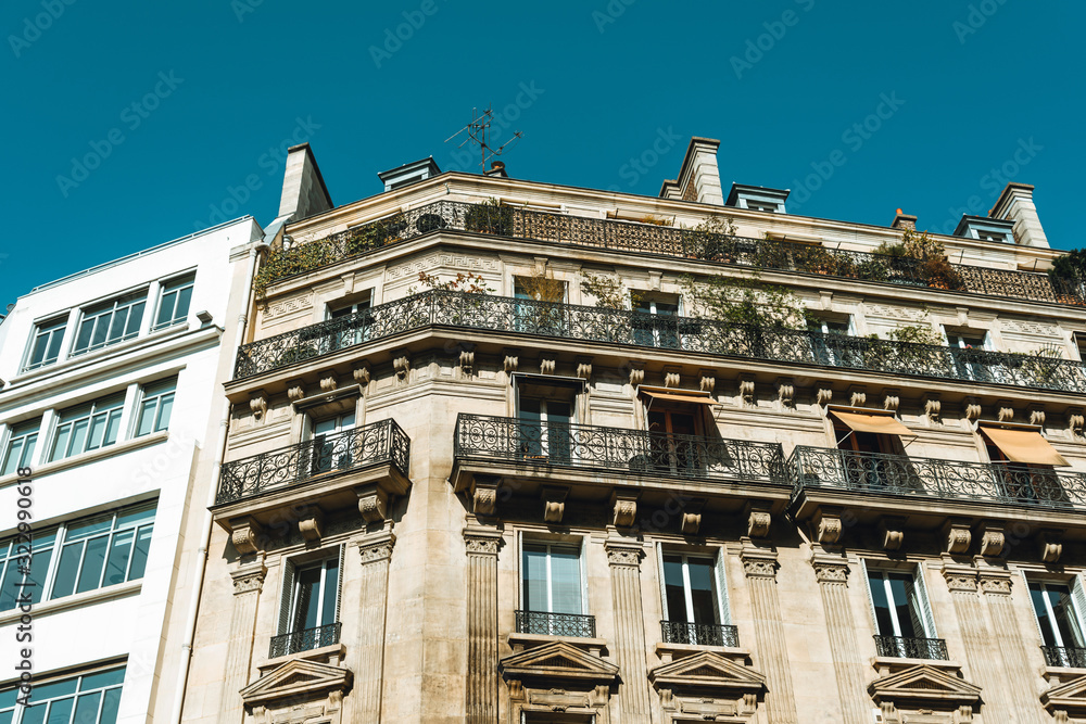 Antique building view in Paris city, France