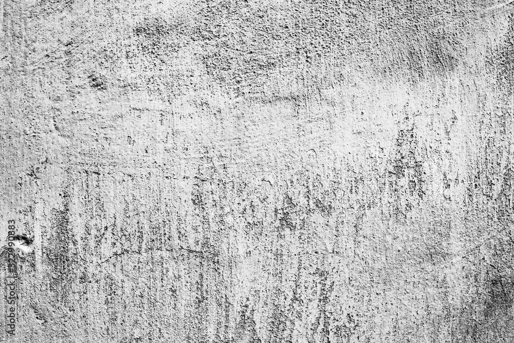 Obraz premium Texture of a concrete wall with cracks and scratches which can be used as a background