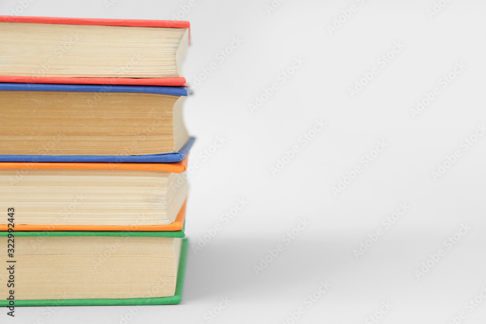 Many books on light background, closeup Many books on light background, closeup