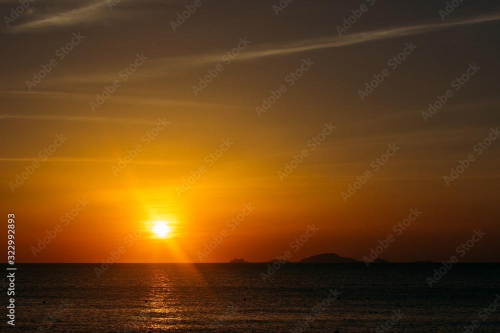 Colorful dawn, sunset on a calm sea, sunrise. Beautiful sea background. A charming start to the day.