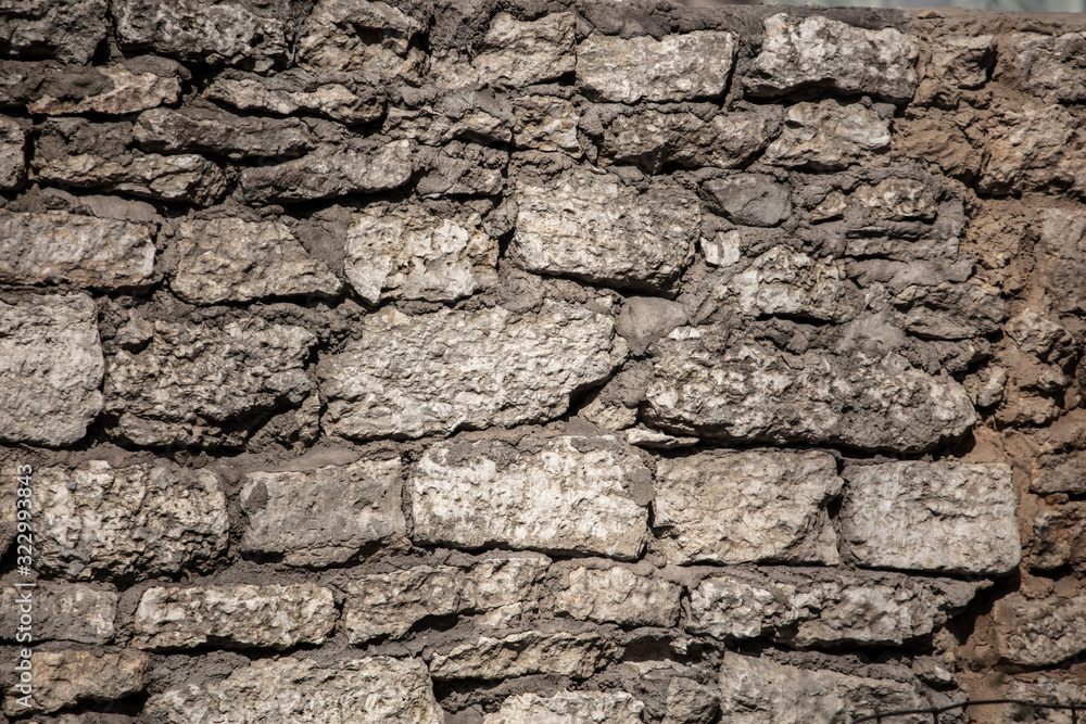 Wall of old stone bricks as a background Wall of old stone bricks as a background