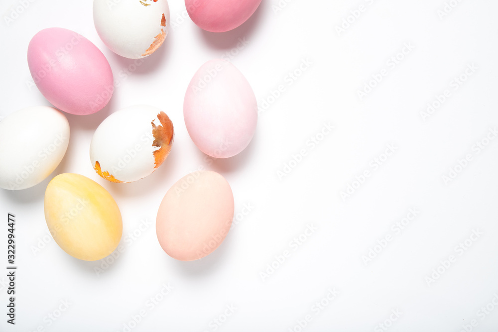 Easter eggs on a white background, place for text, top view, isolation,