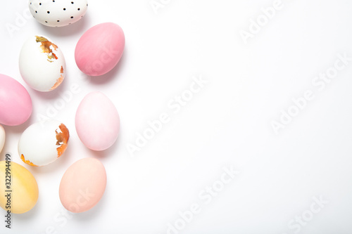 Easter eggs on a white background, place for text, top view, isolation,