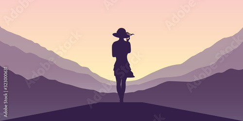 Fototapeta Naklejka Na Ścianę i Meble -  young girl at purple mountain landscape at sunset vector illustration EPS10