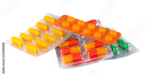 Ð¡olorful pills on white background.